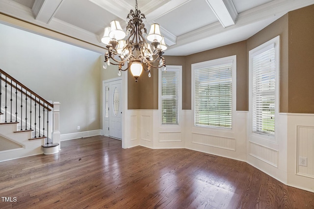 513 Goal Kick, Fuquay Varina, NC 27526 - foyer entrance with wood finished floors, coffered ceiling, wainscoting, beam ceiling, and a chandelier