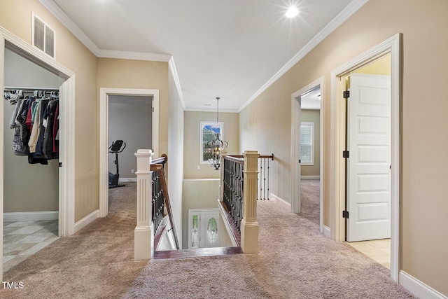 513 Goal Kick, Fuquay Varina, NC 27526 - hall with an upstairs landing, carpet flooring, and crown molding
