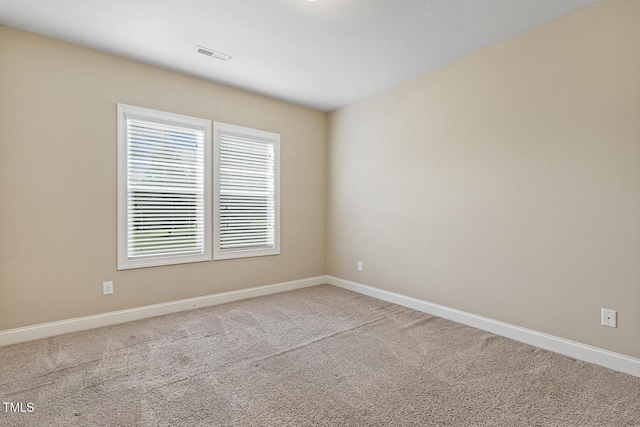 513 Goal Kick, Fuquay Varina, NC 27526 - carpeted spare room with baseboards