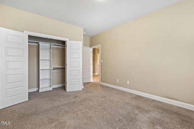 513 Goal Kick, Fuquay Varina, NC 27526 - unfurnished bedroom featuring carpet flooring and a closet