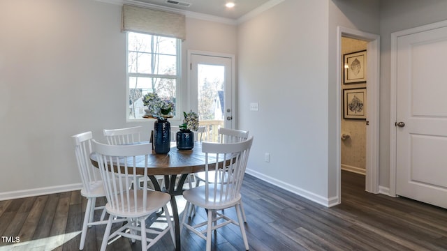 219 Carova Bnd, Apex, NC 27539 - dining room featuring baseboards, ornamental molding, and dark wood-type flooring