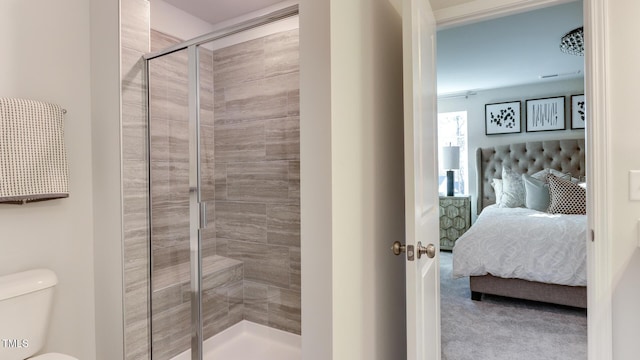 219 Carova Bnd, Apex, NC 27539 - bathroom with connected bathroom, a shower stall, and toilet