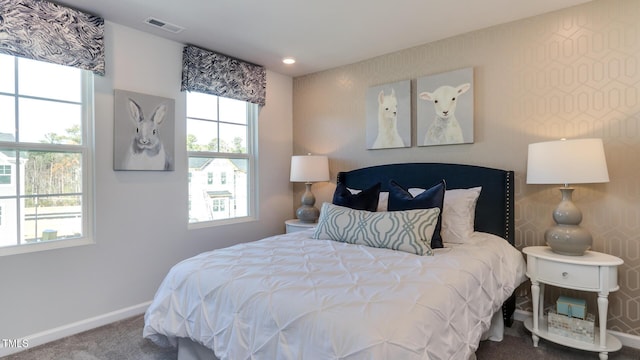 219 Carova Bnd, Apex, NC 27539 - carpeted bedroom featuring baseboards