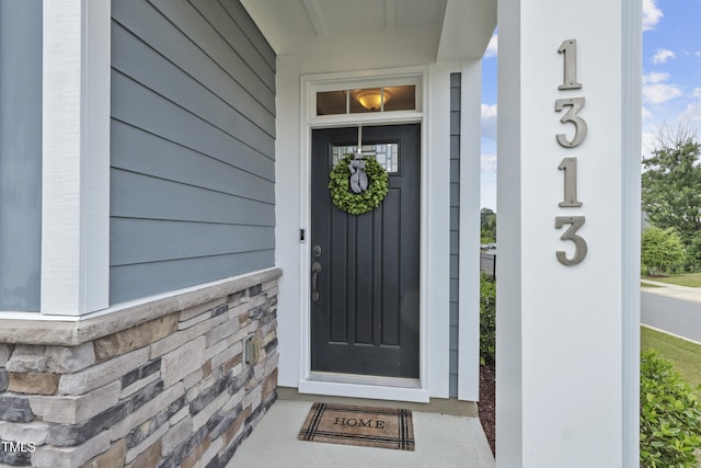 1313 Littlehills Dr, Apex, NC 27523 - doorway to property with stone siding