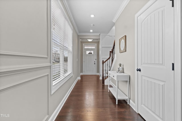 1313 Littlehills Dr, Apex, NC 27523 - hall with crown molding, dark wood finished floors, stairs, and recessed lighting