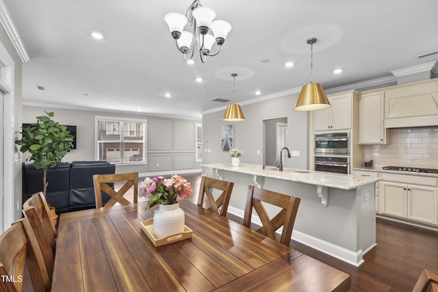 1313 Littlehills Dr, Apex, NC 27523 - dining area featuring recessed lighting, crown molding, dark wood finished floors, and a chandelier