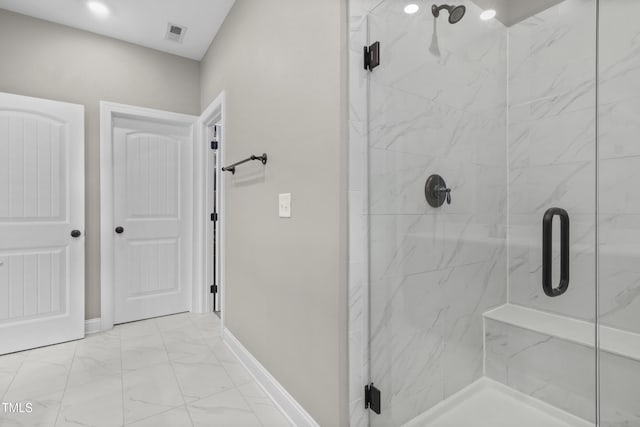 1313 Littlehills Dr, Apex, NC 27523 - bathroom with a marble finish shower and marble look tiles