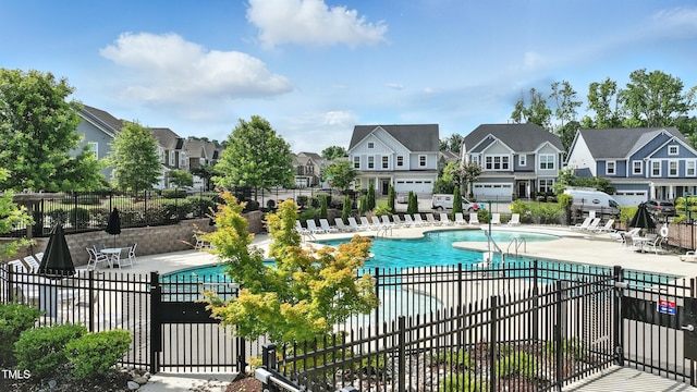 1313 Littlehills Dr, Apex, NC 27523 - community pool with a residential view and a patio area