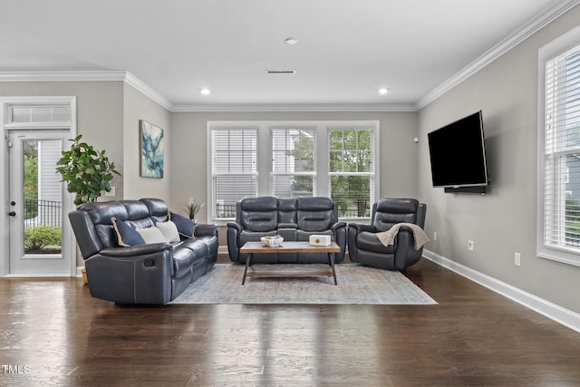 1313 Littlehills Dr, Apex, NC 27523 - living room with healthy amount of natural light, wood finished floors, crown molding, and recessed lighting