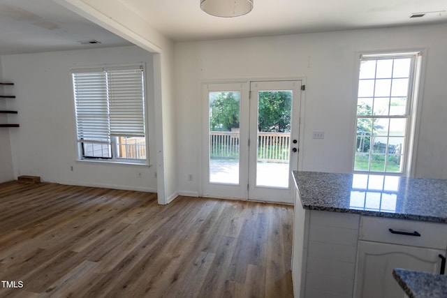 328 Mccarthy Dr, Clayton, NC 27527 - doorway with light wood-style floors and baseboards