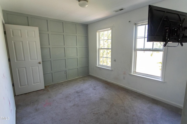 328 Mccarthy Dr, Clayton, NC 27527 - unfurnished bedroom featuring carpet floors and baseboards