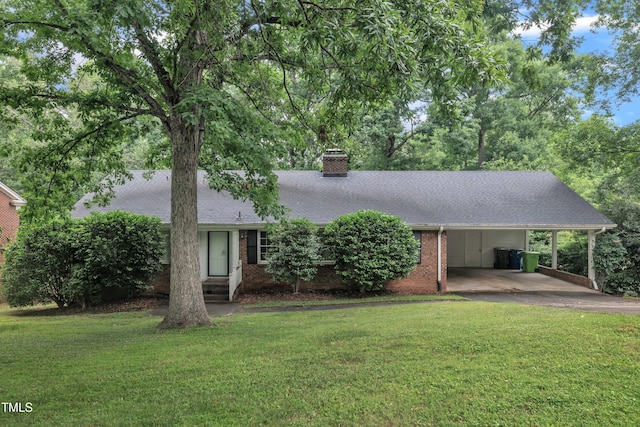 3304 Redbud Ln, Raleigh, NC 27607 - view of front of house with a chimney, brick siding, a carport, and a front yard