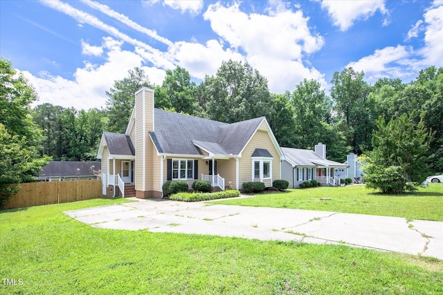 1309 Sweet Charm Ln, Knightdale, NC 27545 - view of front of property with a chimney and roof with shingles