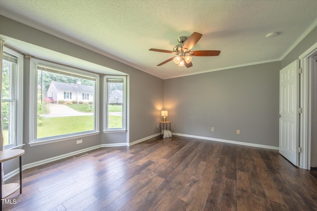 1309 Sweet Charm Ln, Knightdale, NC 27545 - unfurnished room featuring ceiling fan, dark wood finished floors, a textured ceiling, crown molding, and a smoke detector