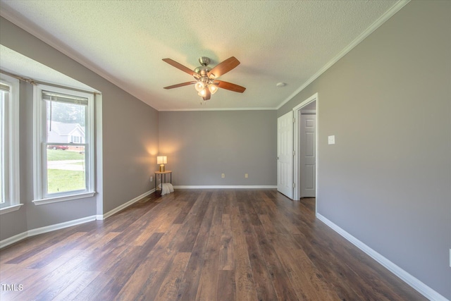 1309 Sweet Charm Ln, Knightdale, NC 27545 - empty room featuring a ceiling fan, a textured ceiling, dark wood-style floors, crown molding, and a smoke detector