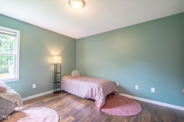 1309 Sweet Charm Ln, Knightdale, NC 27545 - bedroom featuring wood finished floors