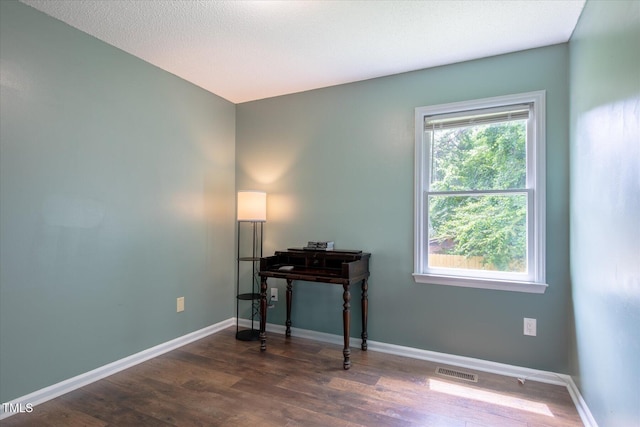 1309 Sweet Charm Ln, Knightdale, NC 27545 - office with dark wood-style flooring and baseboards