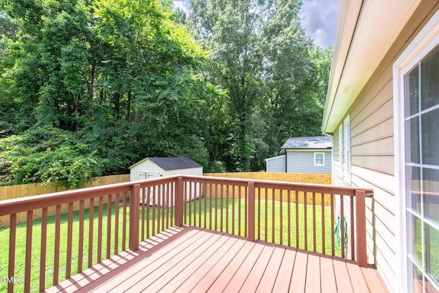 1309 Sweet Charm Ln, Knightdale, NC 27545 - wooden terrace featuring a storage unit and a fenced backyard