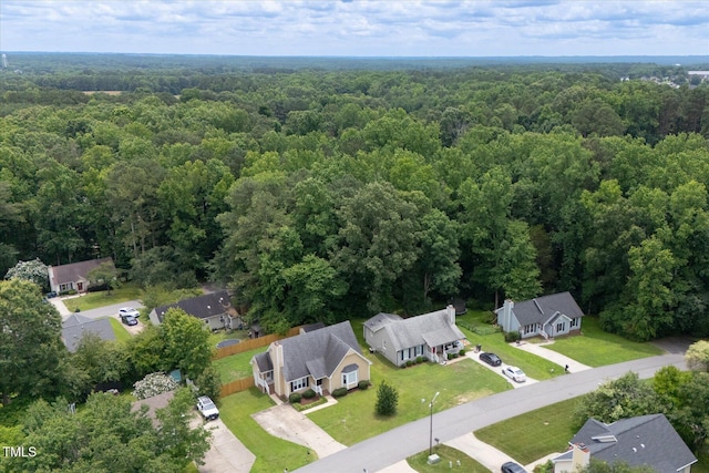 1309 Sweet Charm Ln, Knightdale, NC 27545 - aerial perspective of suburban area featuring a heavily wooded area