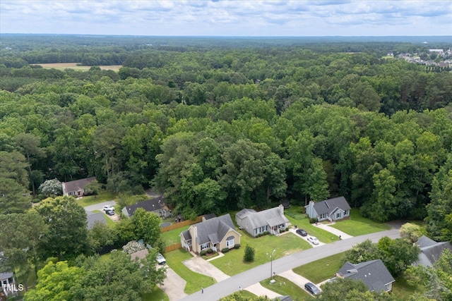 1309 Sweet Charm Ln, Knightdale, NC 27545 - aerial overview of property's location with a heavily wooded area and nearby suburban area