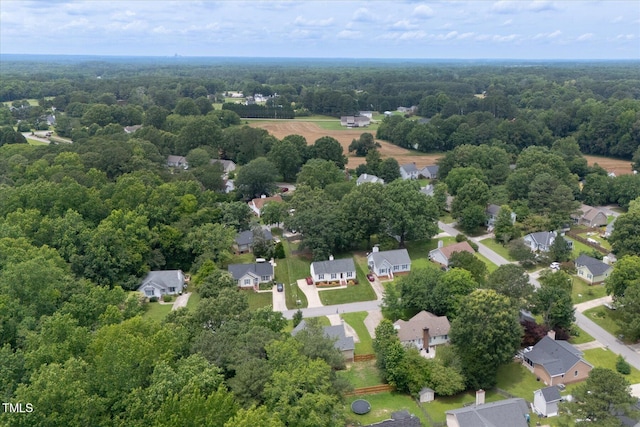 1309 Sweet Charm Ln, Knightdale, NC 27545 - aerial view of residential area featuring a forest