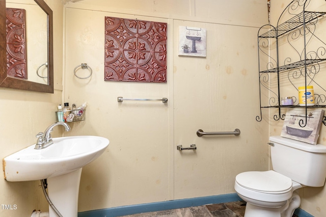 132 Lord Ashley Rd, Raleigh, NC 27610 - half bathroom featuring toilet and baseboards