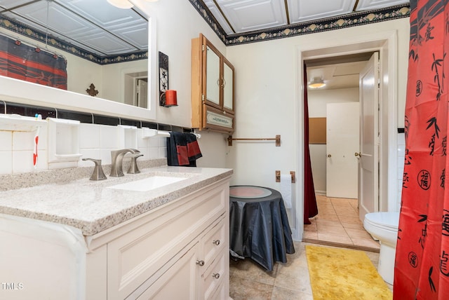 132 Lord Ashley Rd, Raleigh, NC 27610 - bathroom with vanity, tile patterned floors, and backsplash