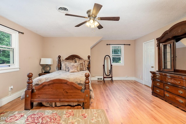 132 Lord Ashley Rd, Raleigh, NC 27610 - bedroom with light wood-type flooring and a ceiling fan