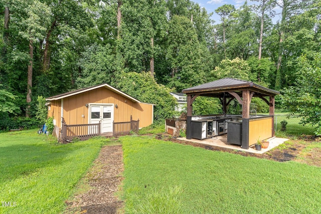 132 Lord Ashley Rd, Raleigh, NC 27610 - view of yard with a gazebo and an outbuilding