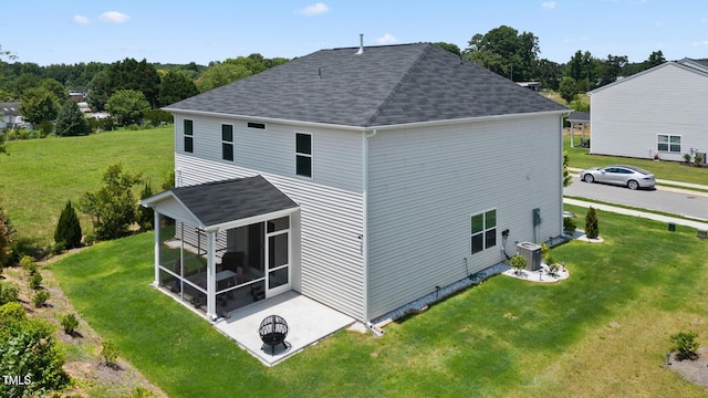 10 Forest Brook Way, Clayton, NC 27520 - rear view of house with a sunroom, a shingled roof, a yard, and central AC unit