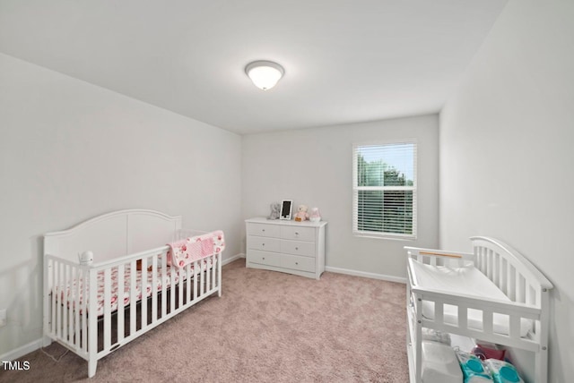 10 Forest Brook Way, Clayton, NC 27520 - bedroom with carpet flooring, a nursery area, and baseboards
