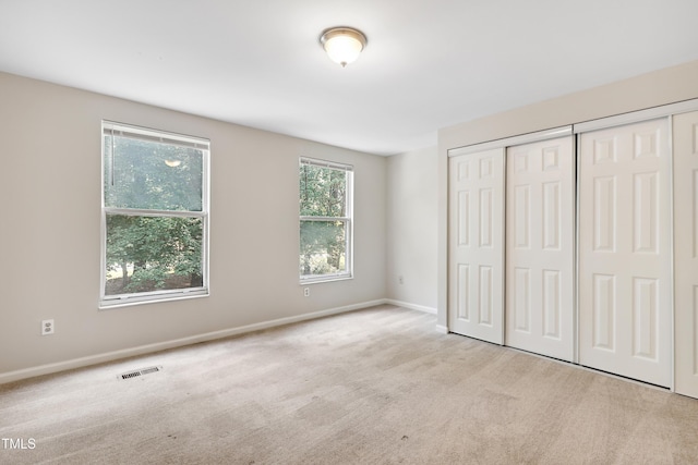 104 Benedict Ln, Raleigh, NC 27614 - unfurnished bedroom with a closet, carpet, and baseboards