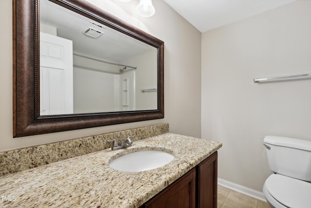 104 Benedict Ln, Raleigh, NC 27614 - full bathroom featuring toilet, vanity, tile patterned floors, and baseboards