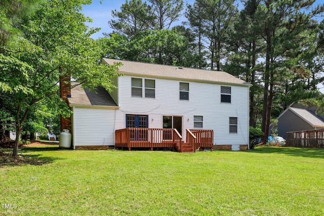 104 Benedict Ln, Raleigh, NC 27614 - back of property with crawl space, a wooden deck, a yard, and a chimney