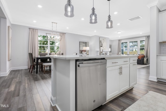 321 Calvander Ln, Apex, NC 27539 - kitchen featuring dishwasher, light countertops, an island with sink, recessed lighting, and dark wood-type flooring