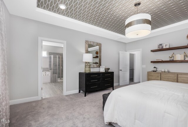 321 Calvander Ln, Apex, NC 27539 - bedroom featuring a tray ceiling, baseboards, light carpet, and ensuite bathroom