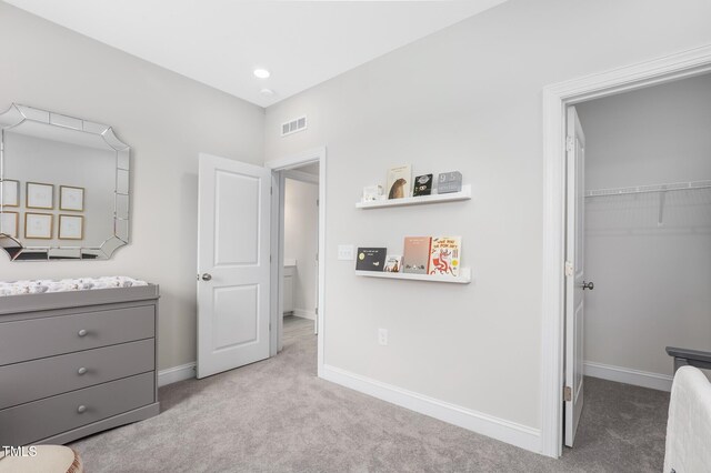 321 Calvander Ln, Apex, NC 27539 - carpeted bedroom featuring a spacious closet, baseboards, and a closet