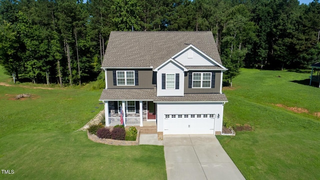 933 Weatherby Ln, Creedmoor, NC 27522 - view of front of property featuring covered porch, driveway, an attached garage, a front lawn, and roof with shingles