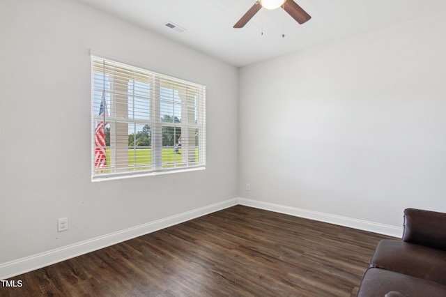 933 Weatherby Ln, Creedmoor, NC 27522 - unfurnished room featuring dark wood-type flooring and a ceiling fan