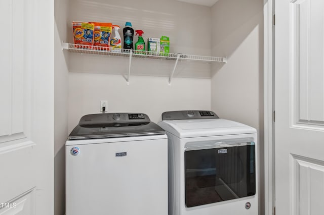 933 Weatherby Ln, Creedmoor, NC 27522 - laundry room with independent washer and dryer