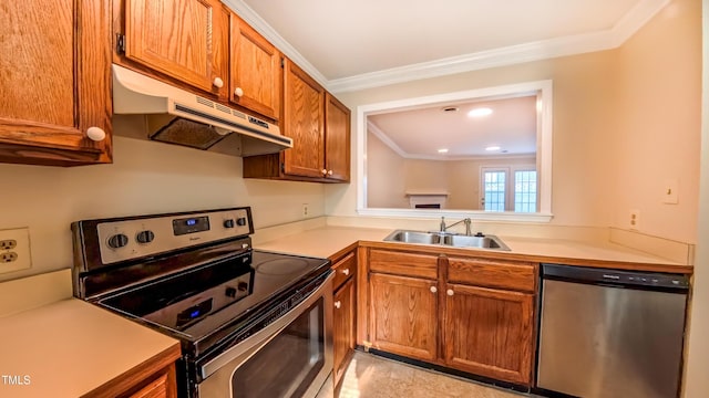 1446 Cimarron Pkwy Unit 64, Wake Forest, NC 27587 - kitchen featuring appliances with stainless steel finishes, under cabinet range hood, ornamental molding, light countertops, and brown cabinets
