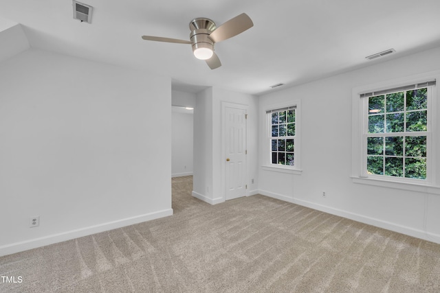 2204 Basil Dr, Raleigh, NC 27612 - carpeted spare room with baseboards and a ceiling fan