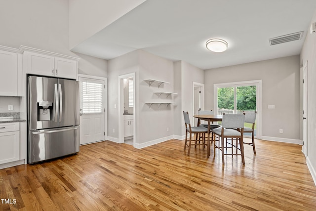 225 E End Ave, Durham, NC 27703 - dining area featuring light wood-type flooring and baseboards
