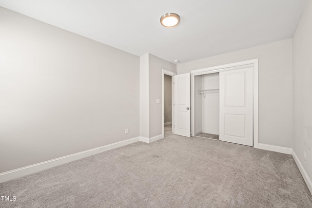 225 E End Ave, Durham, NC 27703 - unfurnished bedroom featuring carpet floors, baseboards, and a closet