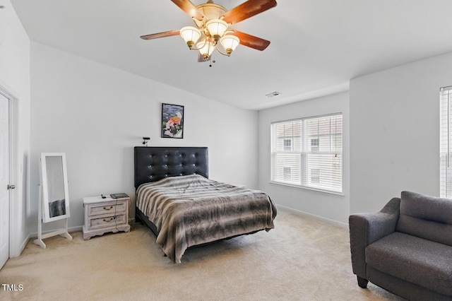 8620 Neuse Club Ln Unit 107, Raleigh, NC 27616 - bedroom with light carpet and a ceiling fan