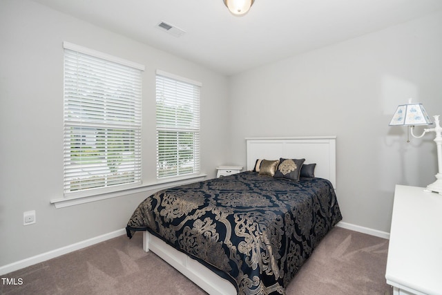 512 Courtship Cv, Durham, NC 27703 - carpeted bedroom featuring baseboards