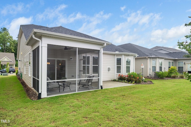 512 Courtship Cv, Durham, NC 27703 - back of house with a patio, a yard, a sunroom, and ceiling fan