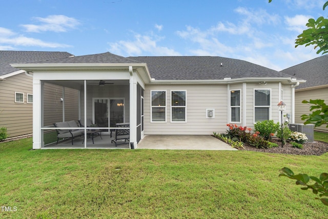 512 Courtship Cv, Durham, NC 27703 - rear view of house featuring a patio area, a sunroom, a yard, a shingled roof, and ceiling fan