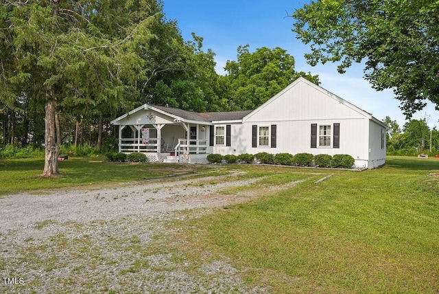 784 Crawford Rd, Coats, NC 27521 - view of front of property featuring covered porch and a front lawn