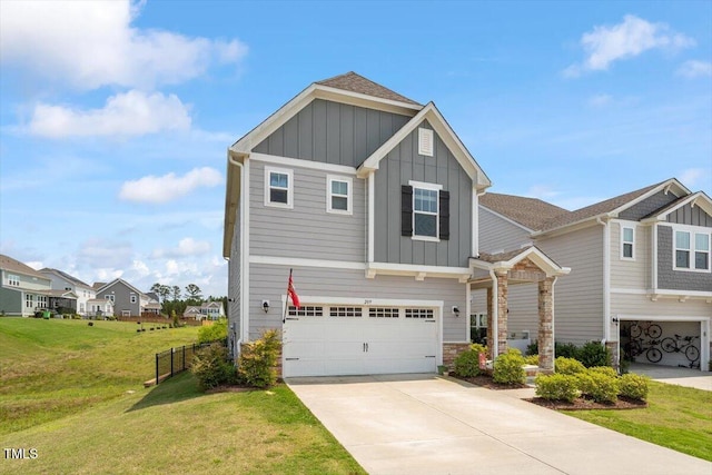 209 Sage Oak Ln, Holly Springs, NC 27540 - craftsman-style house with board and batten siding, a garage, driveway, and stone siding